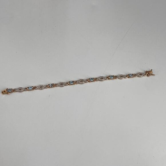 Blue topaz 18 k goldplated diamond accent sterling silver bracelet - Picture 1 of 5